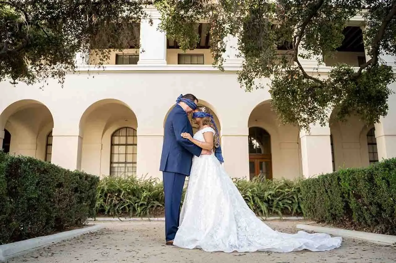 Couple in a courtyard on their wedding day in Los Angeles
